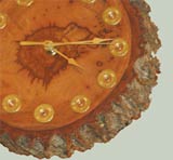 One of Ken Plunk's wood-carved clocks.