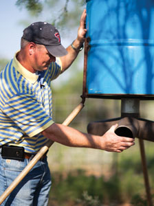 Steve Estes and deer feeder