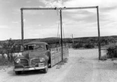 Old car in gate