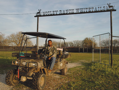 Vernon Mosley at ranch entrance