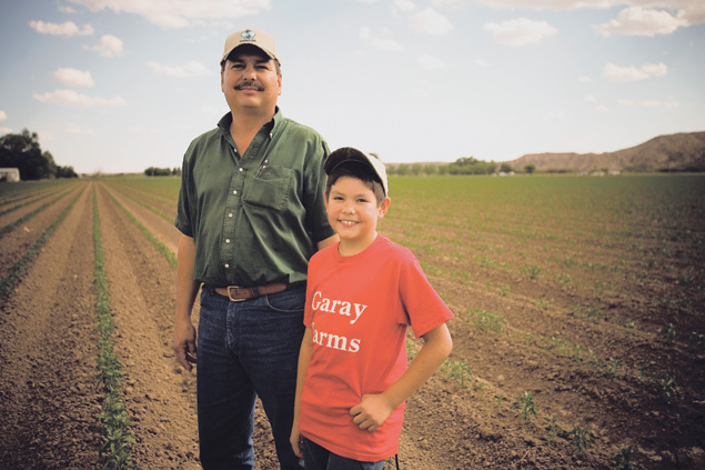 Randy and Darren Garay in their field