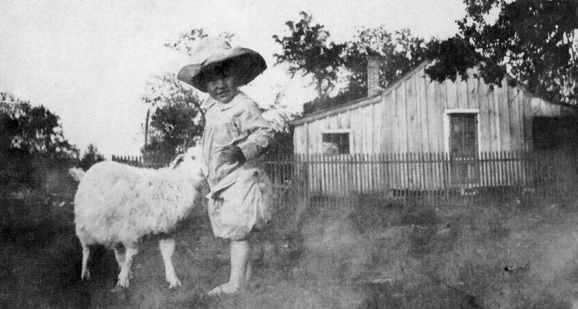A child and his pet goat in Coryell County, Texas — late 1800s