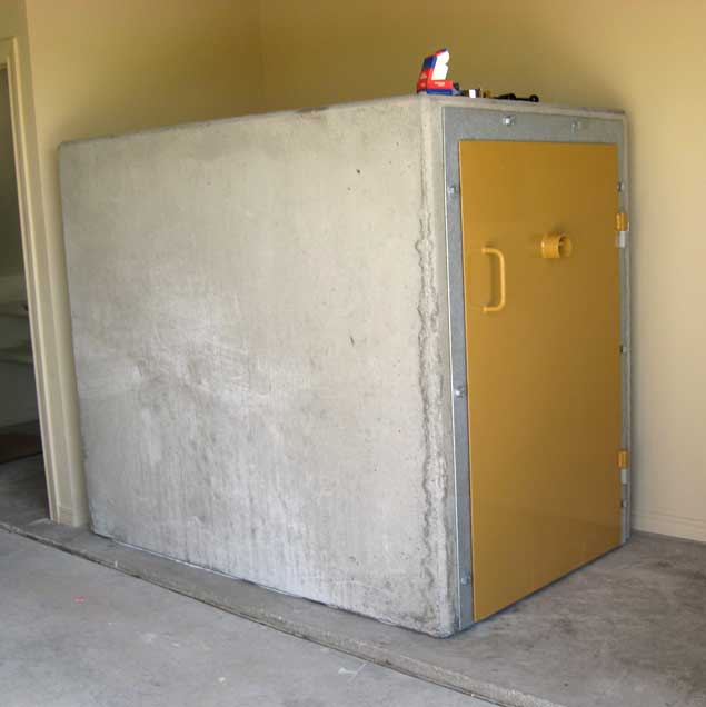 A precast concrete shelter installed in a garage
