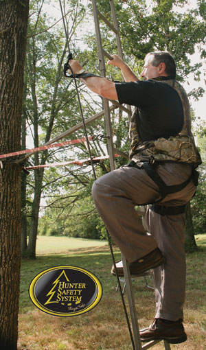 Jim Barta climbs tree stand