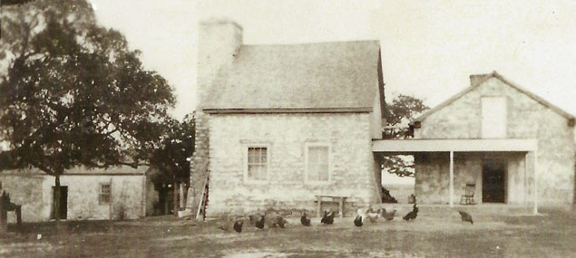 Main house with two stone rooms and detached kitchen