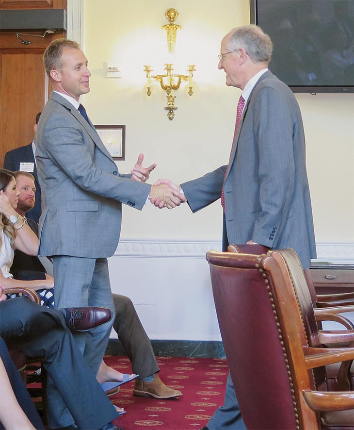 Jeremy Brown shakes hands with U.S. Rep Mike Conaway