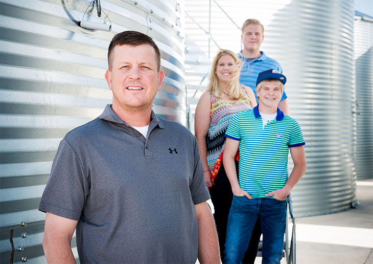 Justin Crownover, foreground, and his wife, Stephanie, and sons Cole, top, and Connor are part of the team at Lone Star Family Farms.