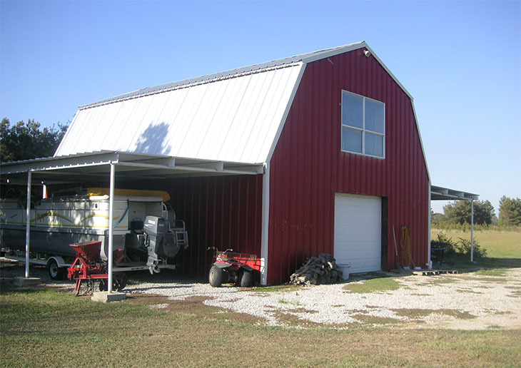 A red barndo with silver roof