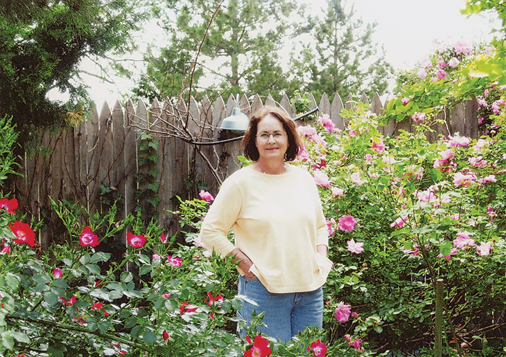 Porch of a ranch house with wildflowers