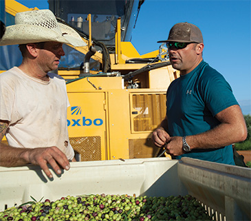 Stephen Coffman visits with a crew member