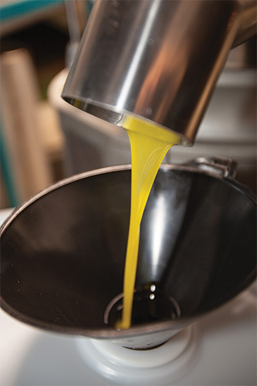 Pouring olive oil