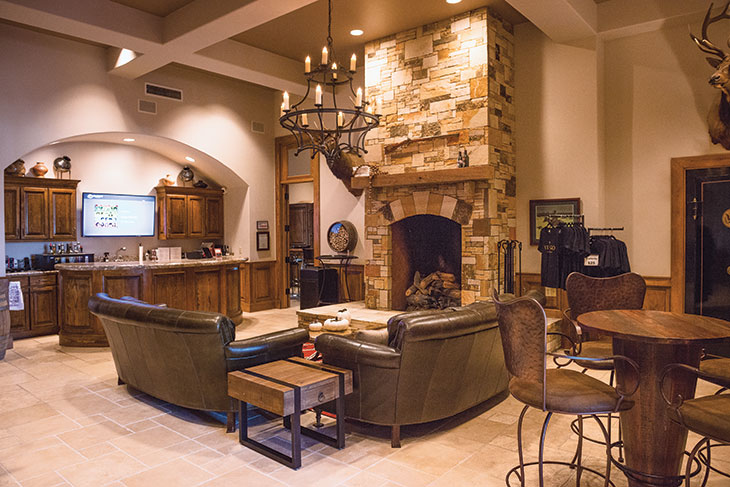 Tasting room with a lounge area and fireplace