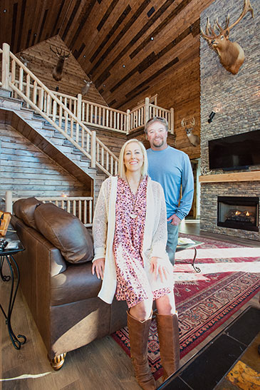 Kim and Tim Horton in the wood and stone interior of Willow Oak Lodge