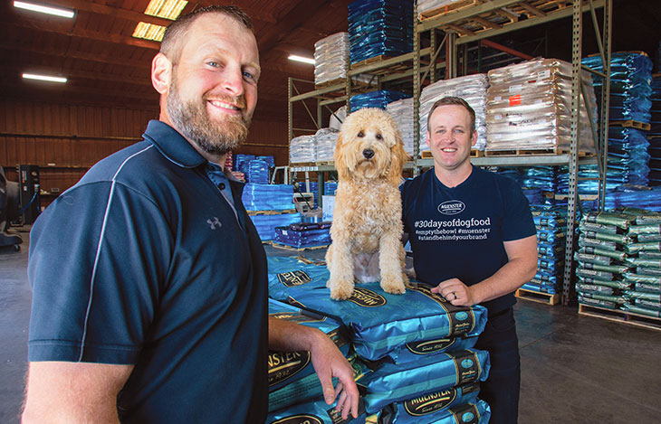 Chad and Mitch Felderhoff with Grandpa Joe, Mitch’s goldendoodle