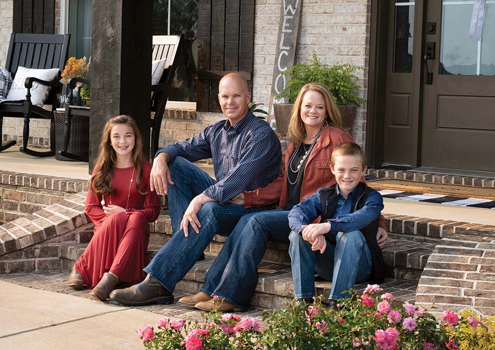photo of Vowell family sitting on their front porch