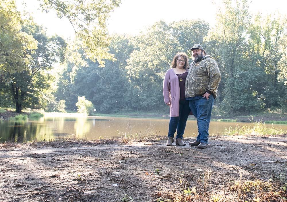 photo of Rachelle and Malcom Reed enjoying their rural property near Hernando, Mississippi