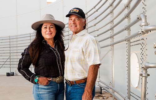 The Ginggs standing inside a large effluent tank