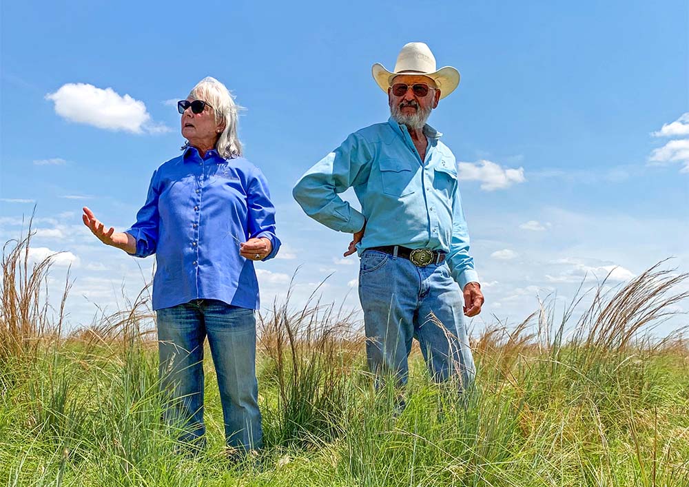 Deborah Clark and Emry Birdwell standing in a field